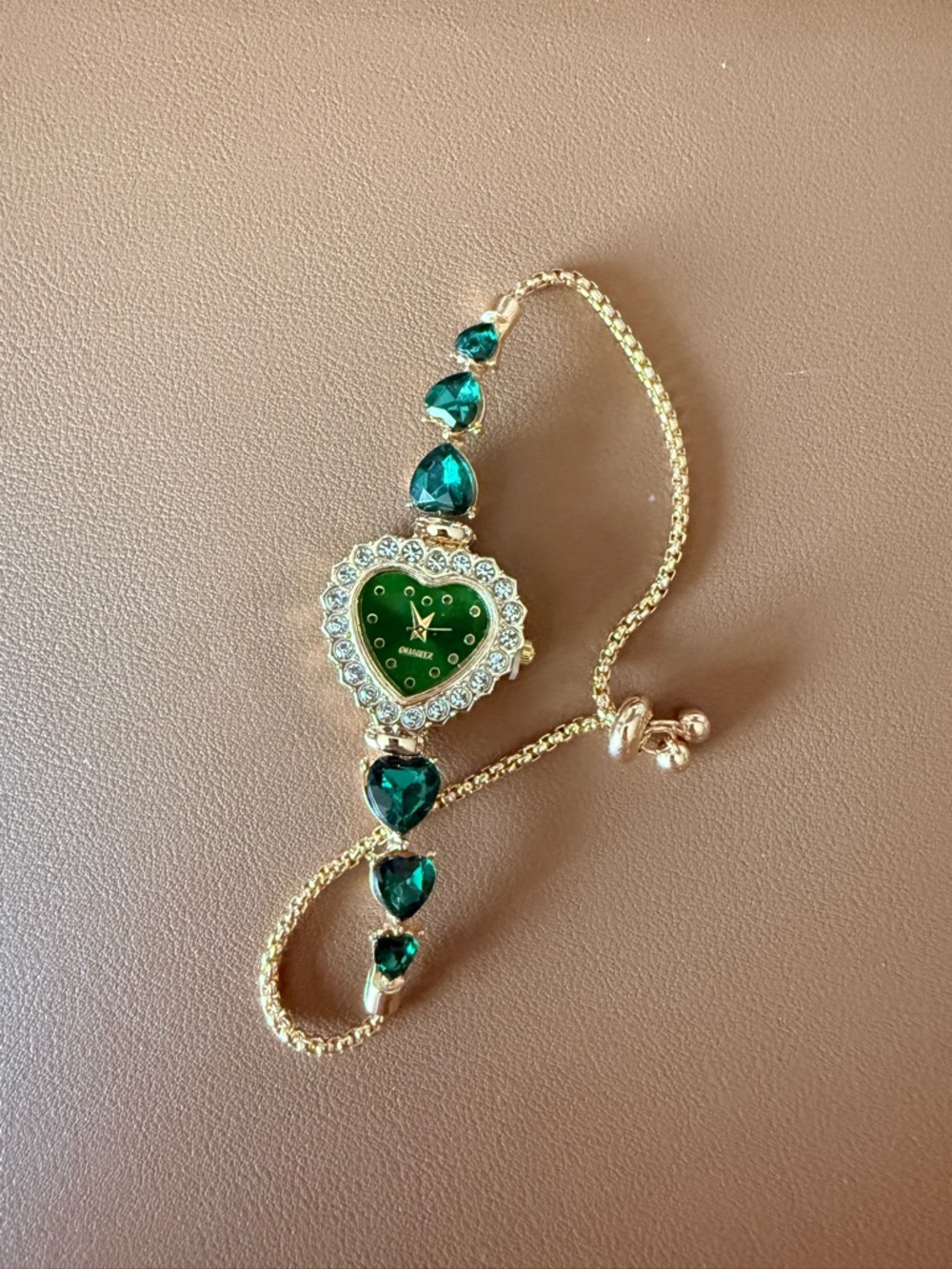 Gold-Tone Heart Bracelet Watch with Green Gem Accents